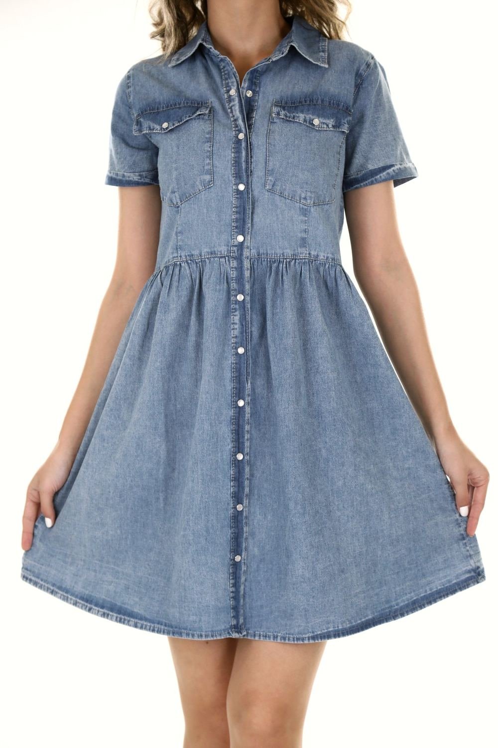 Washed denim dress in the afternoon light