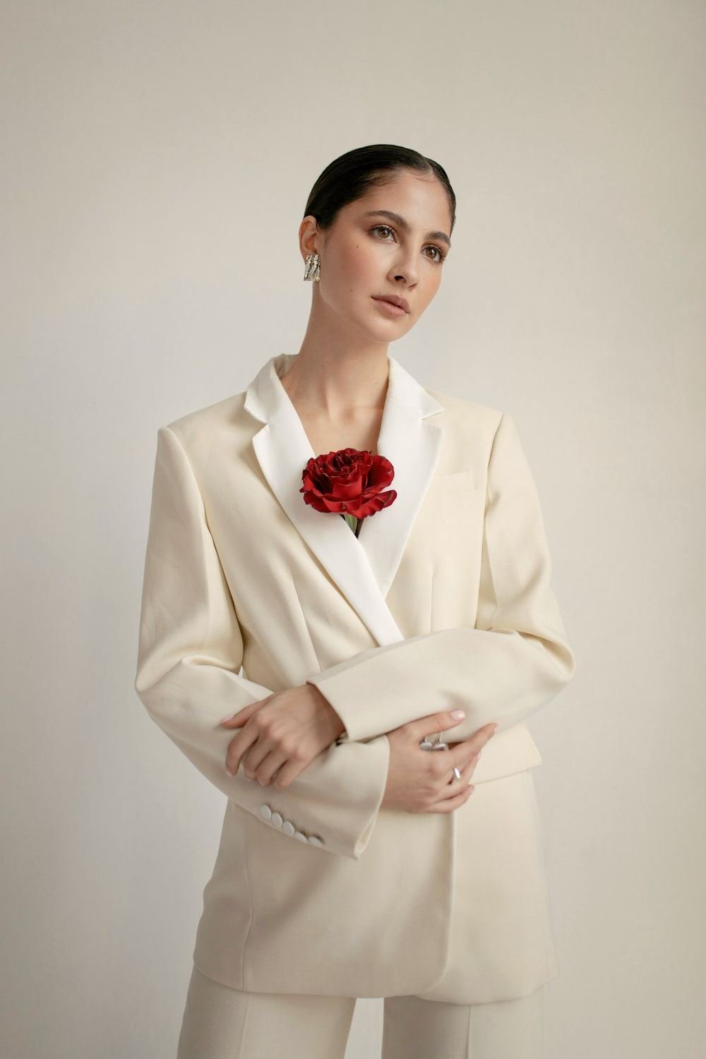 Cream silk suit with relaxed tailoring